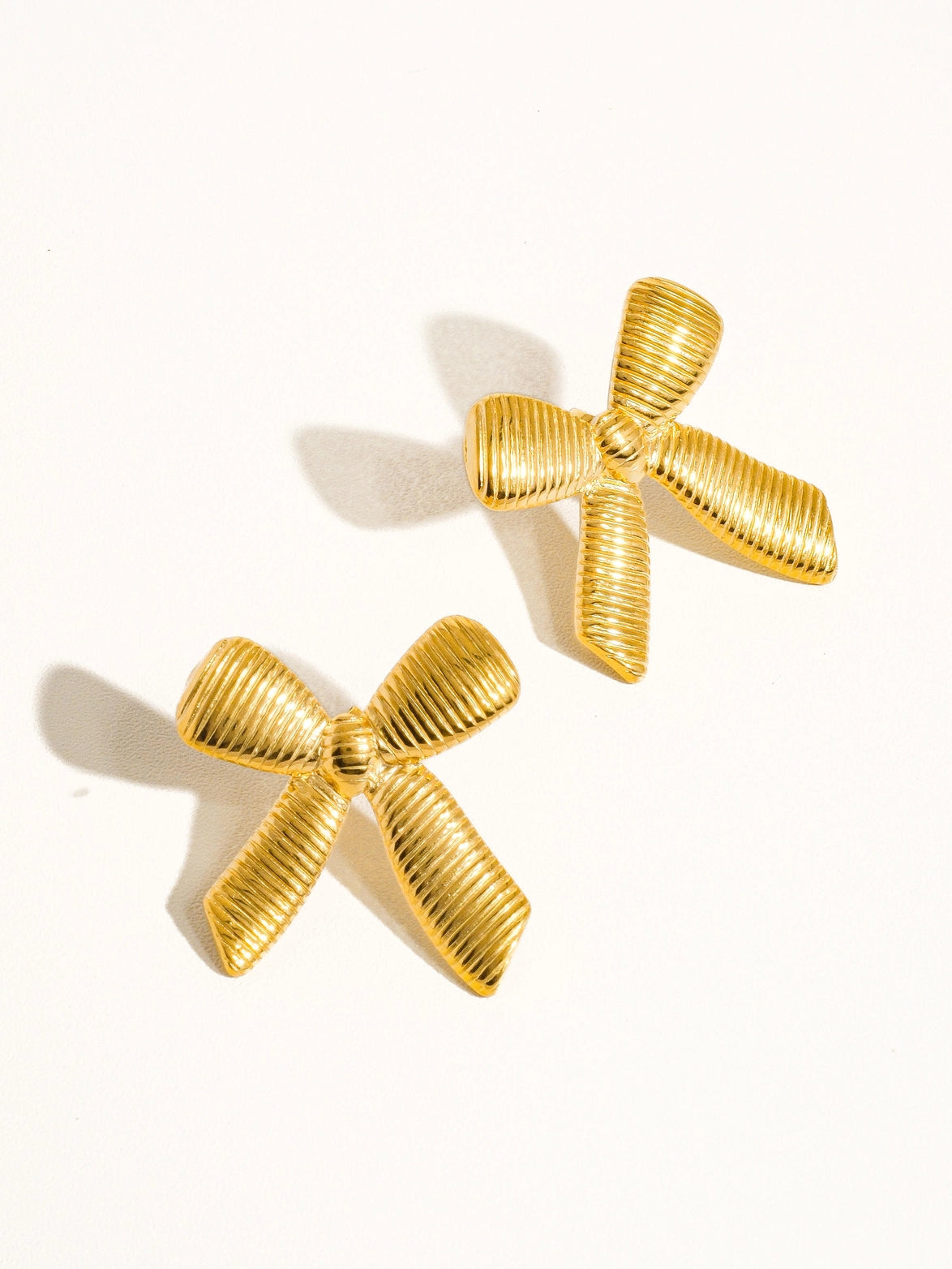 Noelle Ribbed Gold Bow Earrings