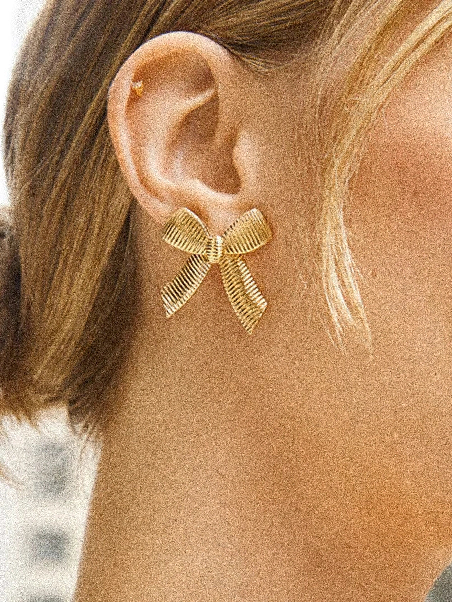 Noelle Ribbed Gold Bow Earrings
